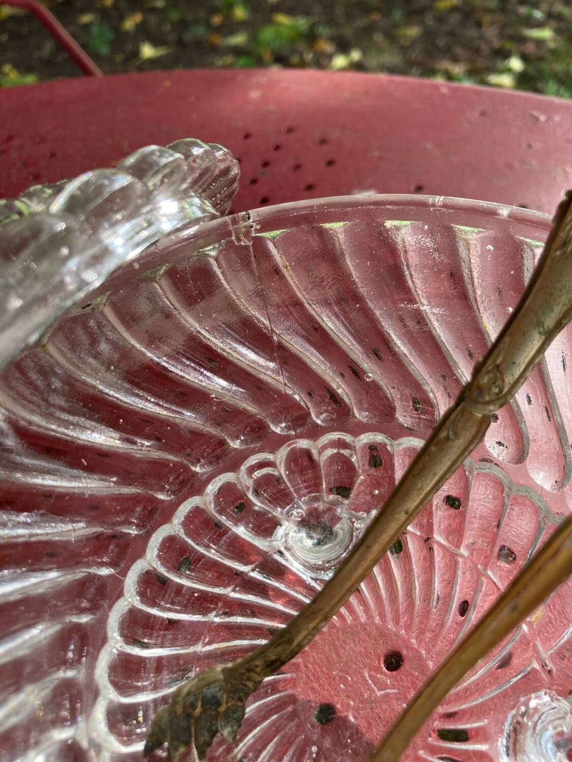 Glass sugar bowl and brass tongs