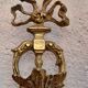 Applique en bronze doré