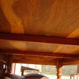 Solid wood and wrought iron table