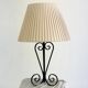 Vintage wrought iron table lamp in swirl shape with pleated shade