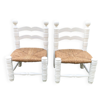 Pair of vintage straw-seated chairs by Charles Dudouyt.