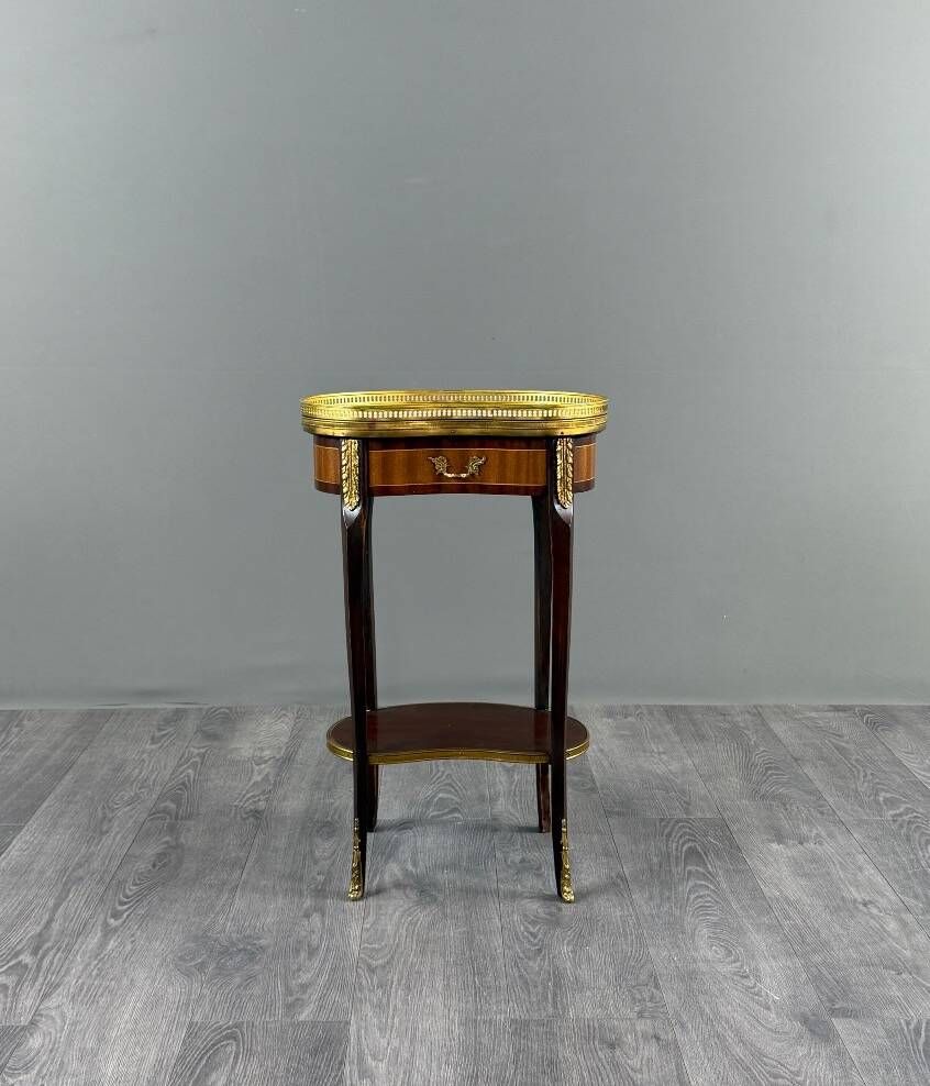 Louis XVI style gueridon in mahogany and gilded bronze, 20th century