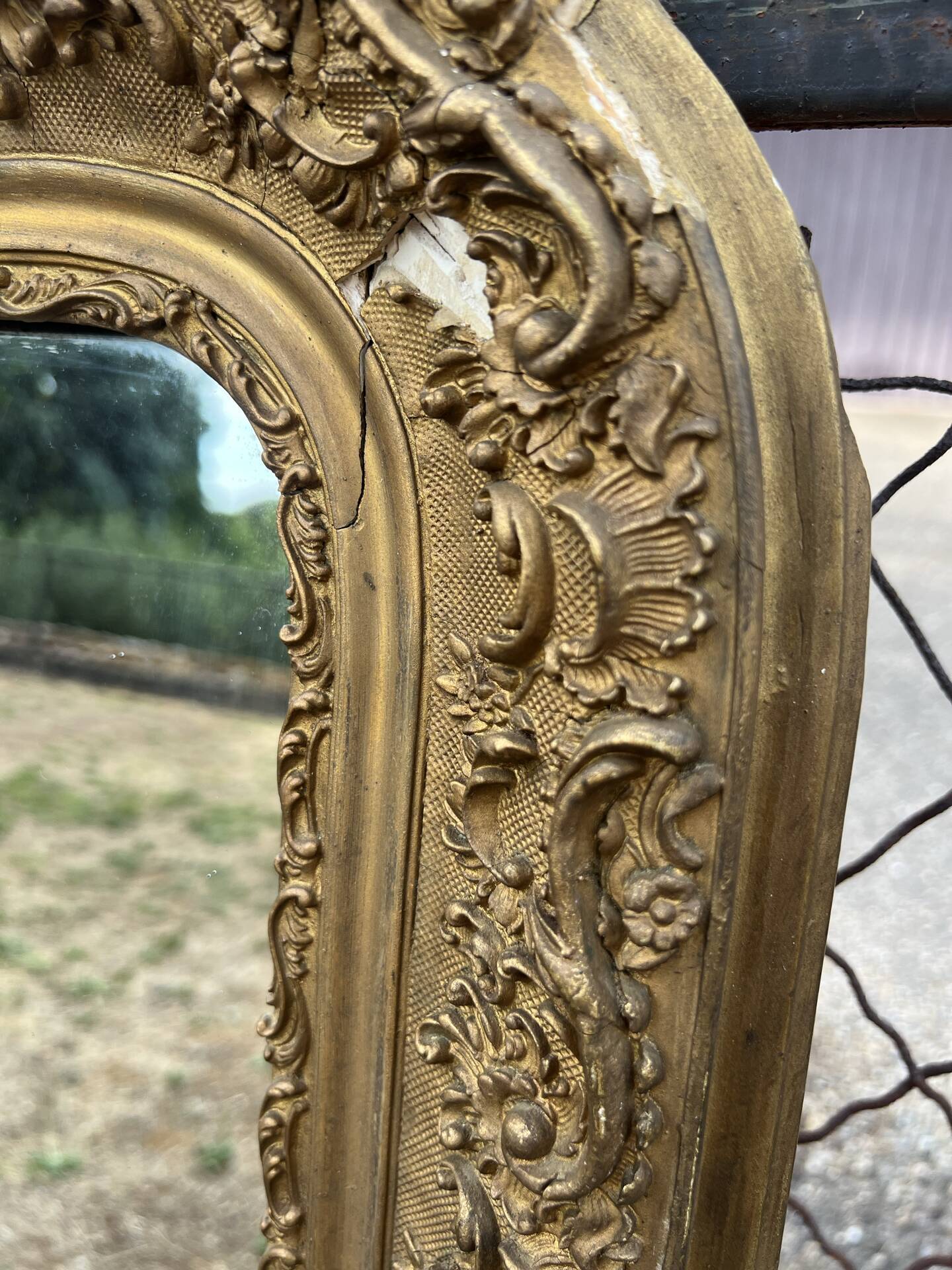 Large gilded sculpted Louis-Philippe mirror, mercury 104x77cm