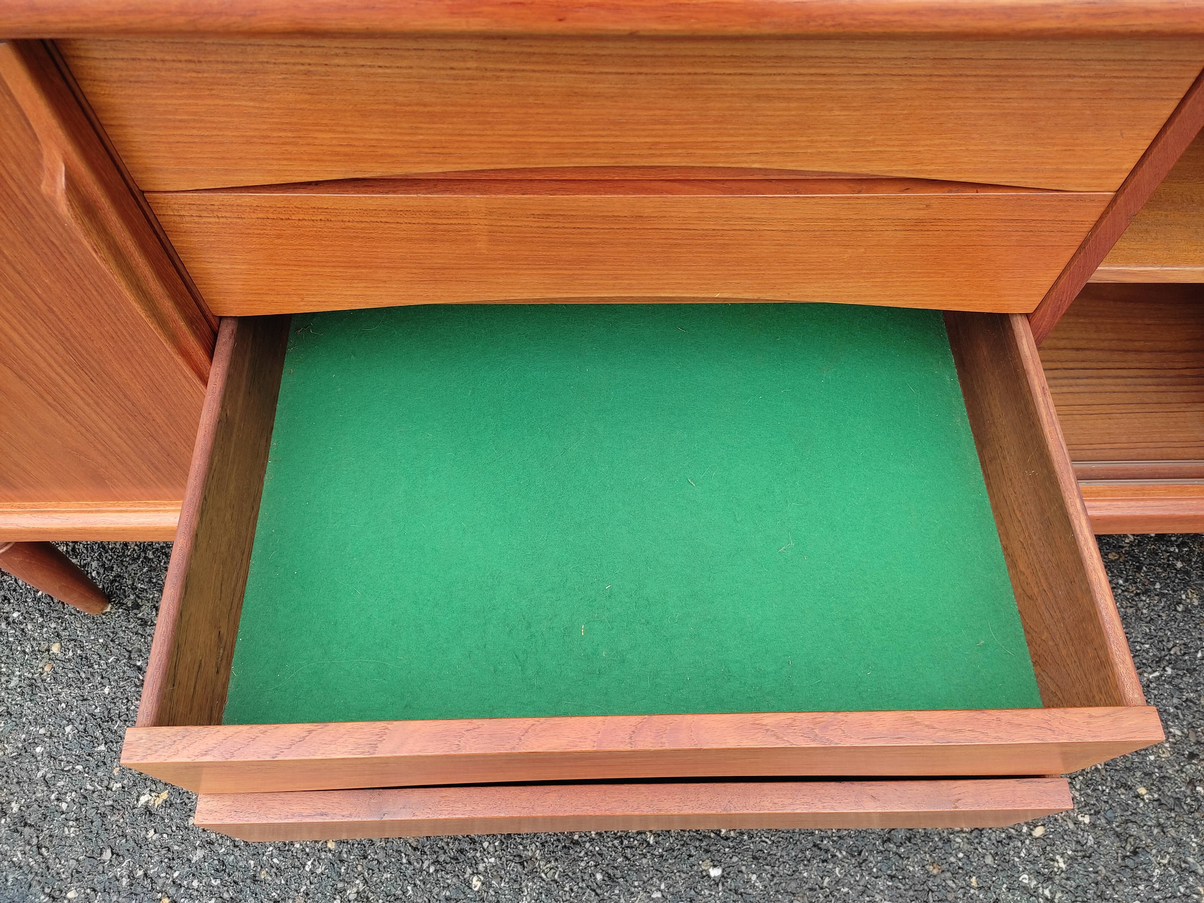 Scandinavian teak row by Axel Christensen for ACO Mobler