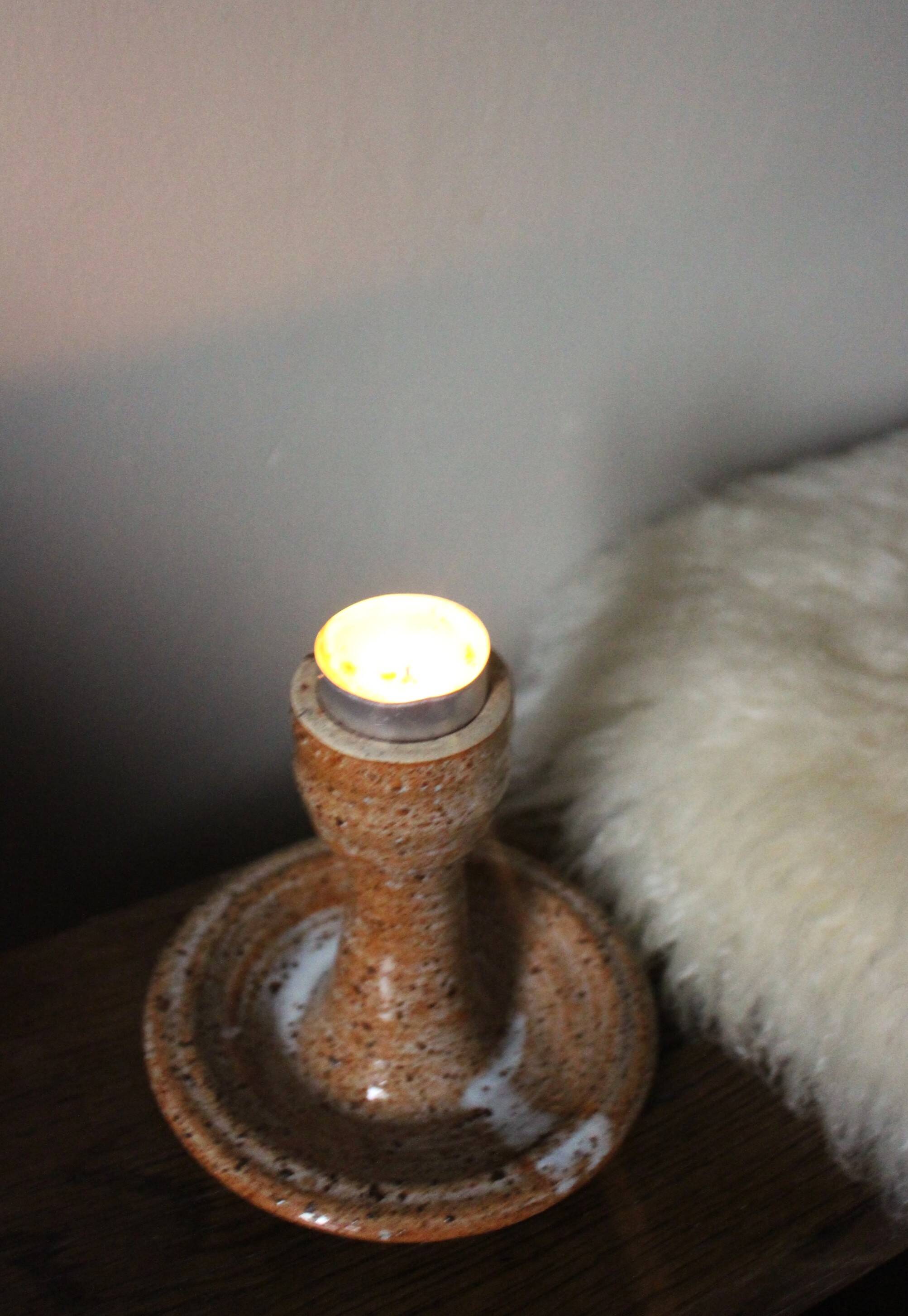 Vintage speckled rust round stoneware candlestick