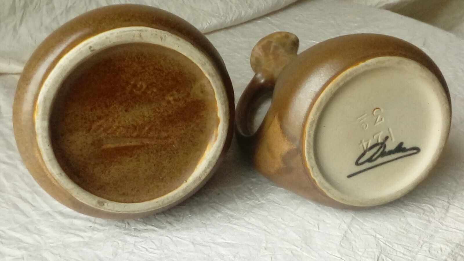 Flame sandstone pitchers signed Denbac