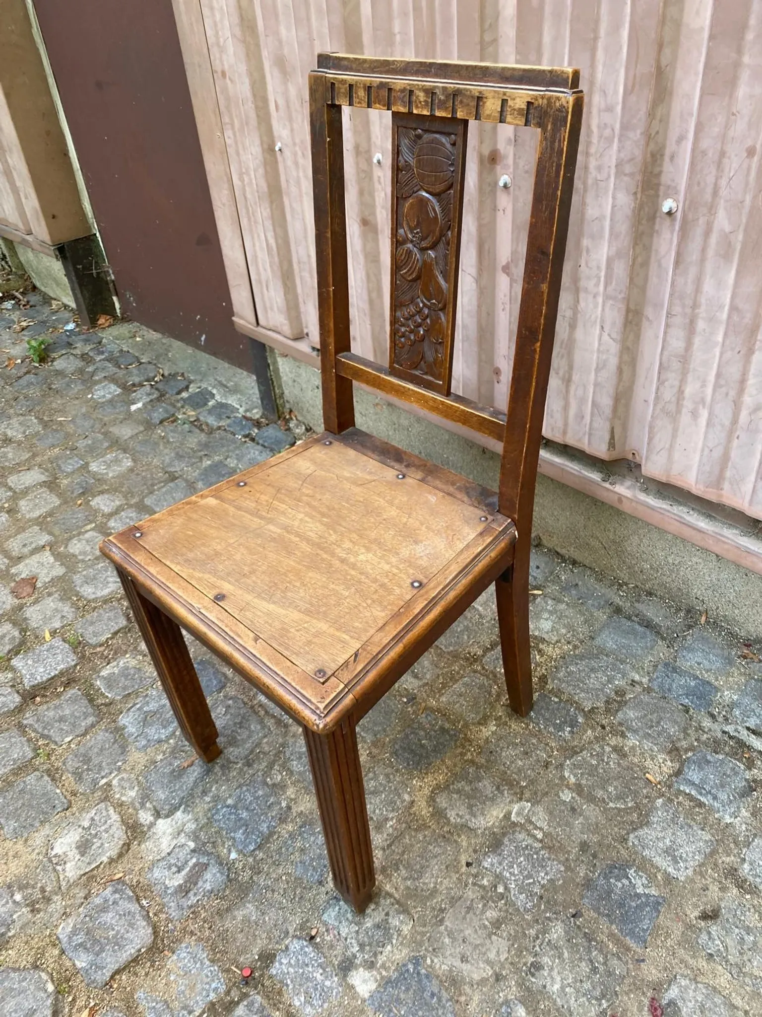 Vintage Art Deco chair in carved oak from the 1930s.