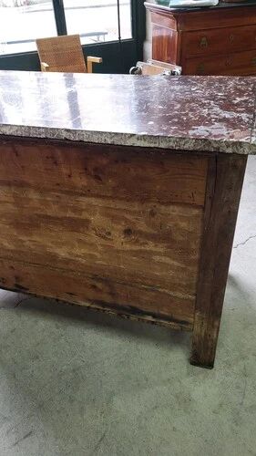 Very Louis XV from the 18th century in walnut with a marble top.