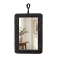 Vintage black wall mirror with floral decoration