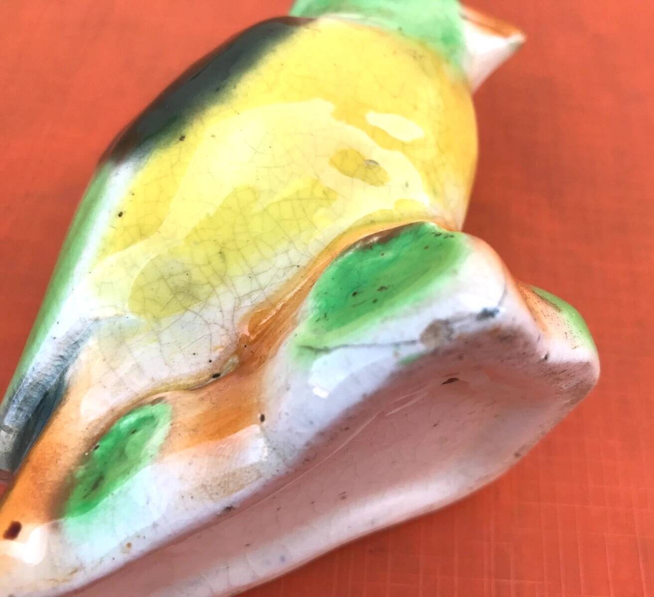 Polychrome ceramic parrot shape