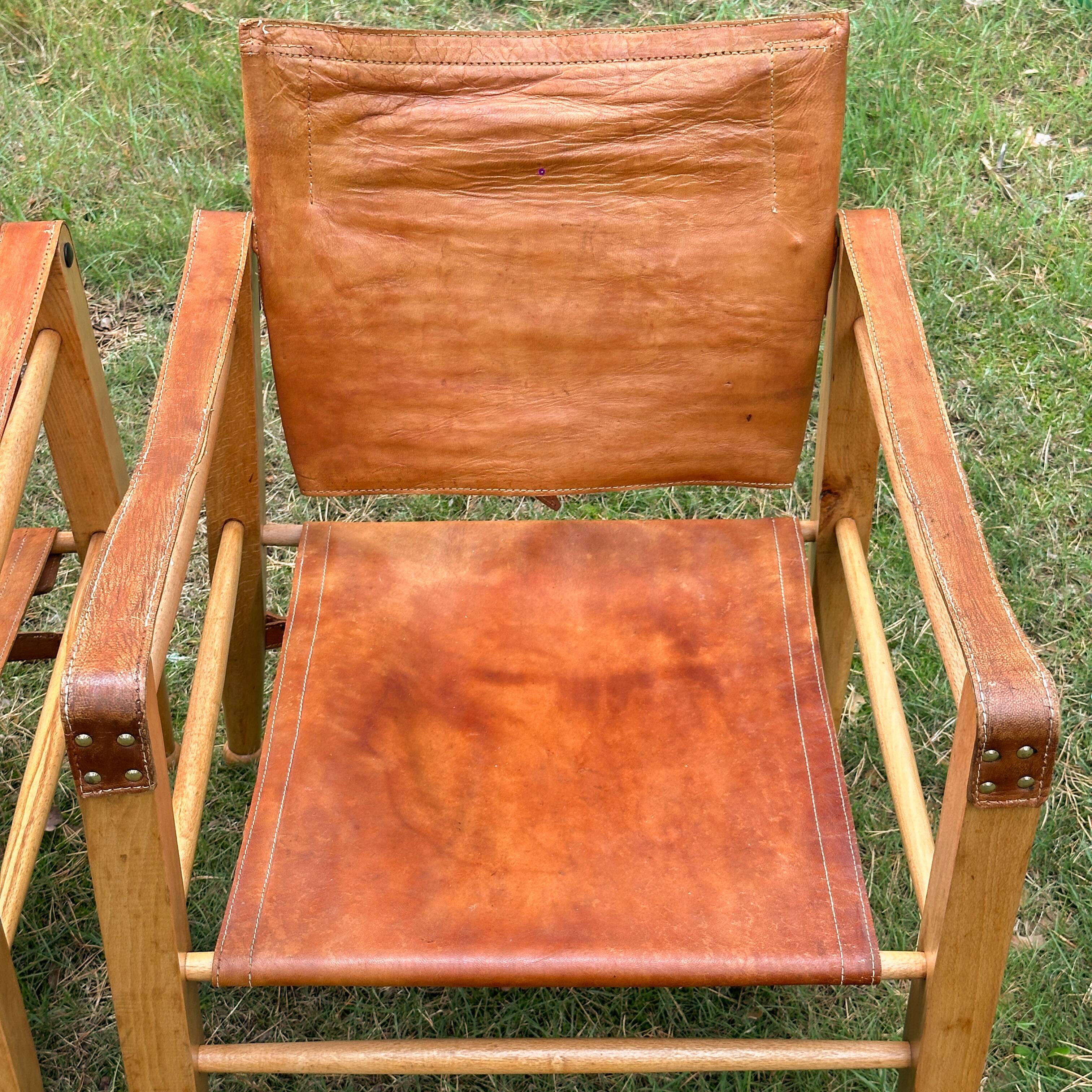A pair of Danish beechwood and leather Safari armchairs - 1960