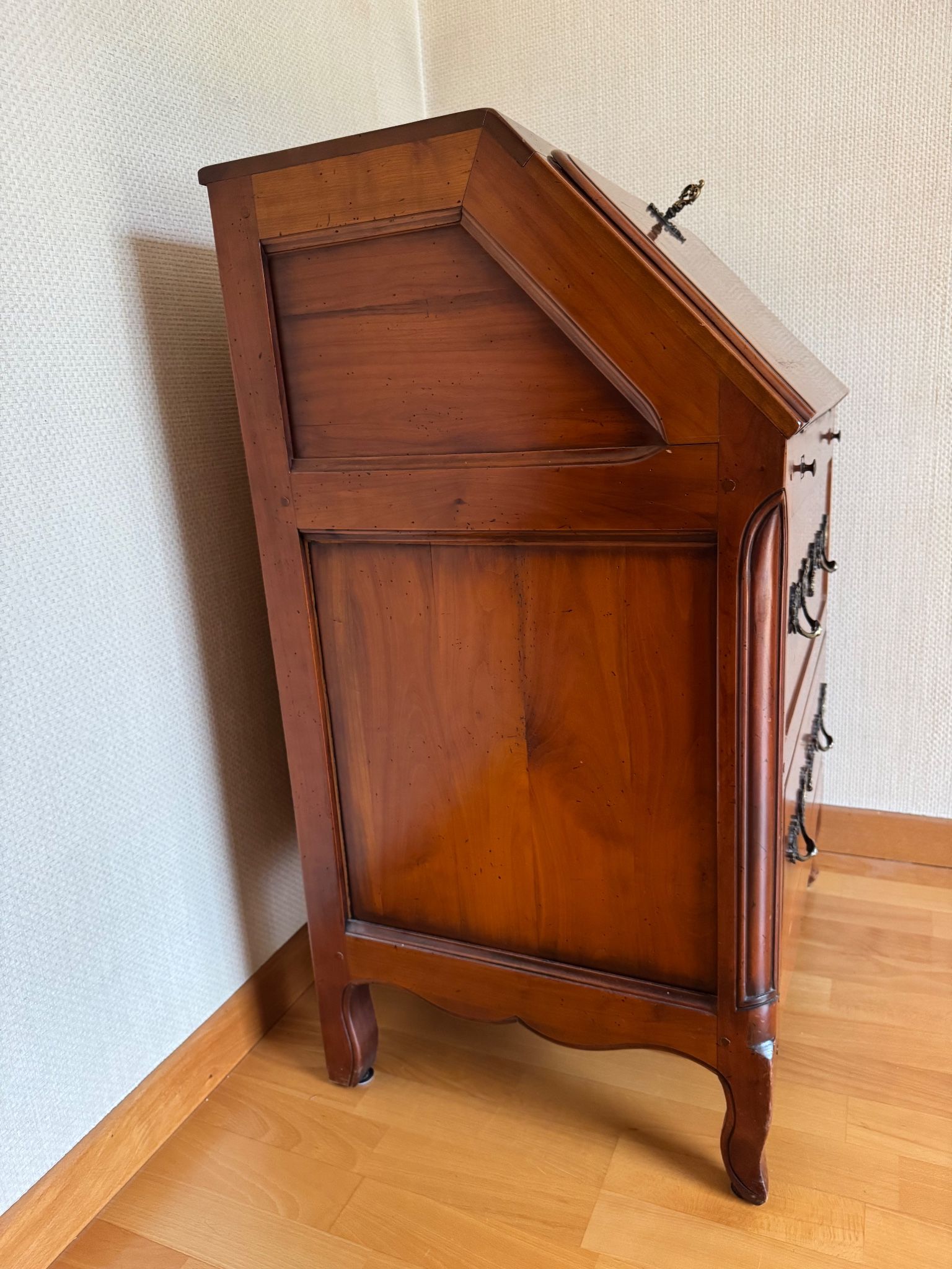 Secretary with drop-down front, signed Jean Laick, master cabinetmaker, cherry wood.