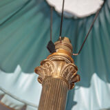 Brass lamp with vintage blue laminated lampshade