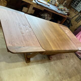 Art Deco table with extensions.