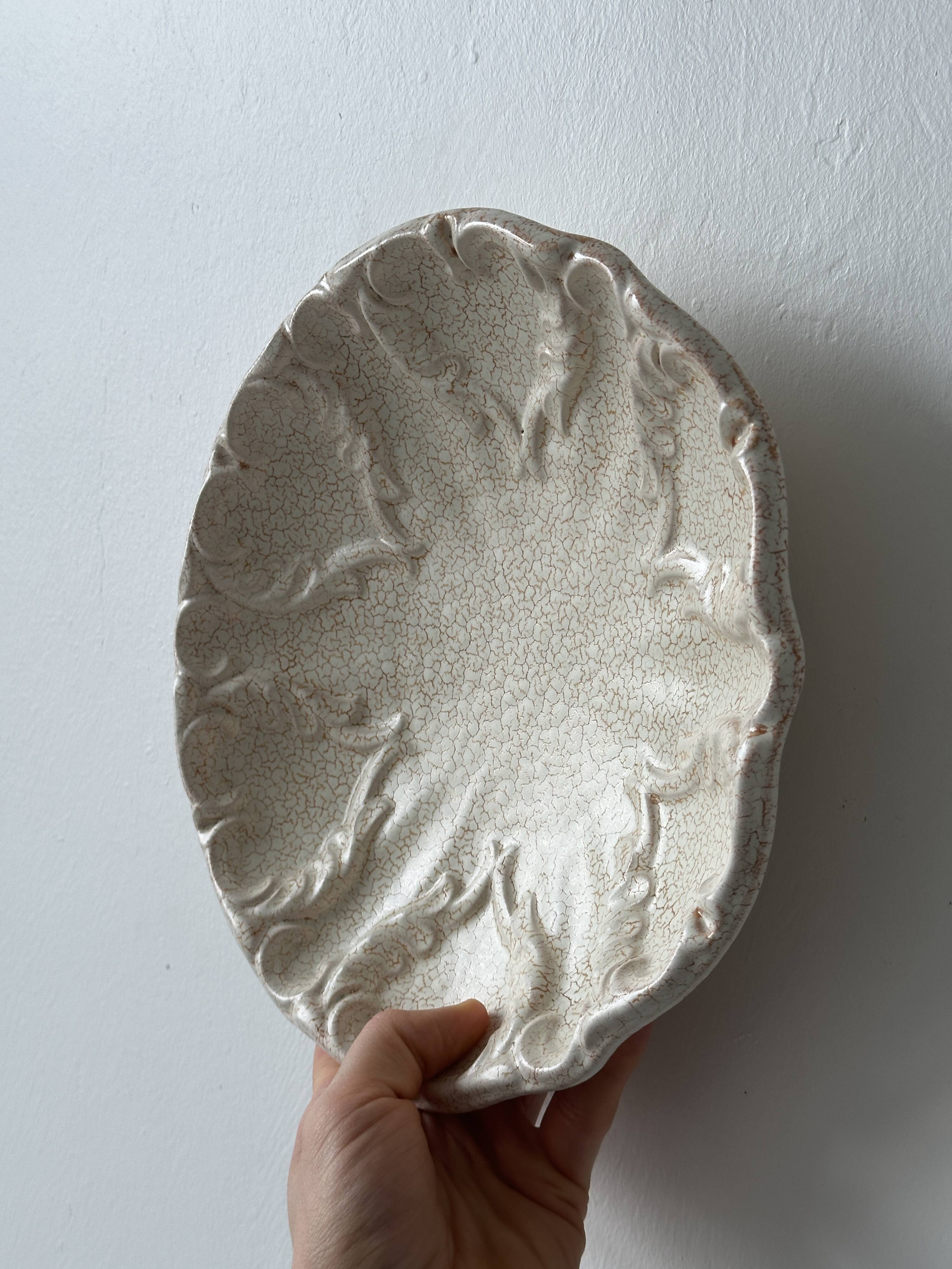 Fluted cracked terracotta dishes - fluted wall plates