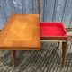 Table vintage portefeuille en chêne aux pieds compas.