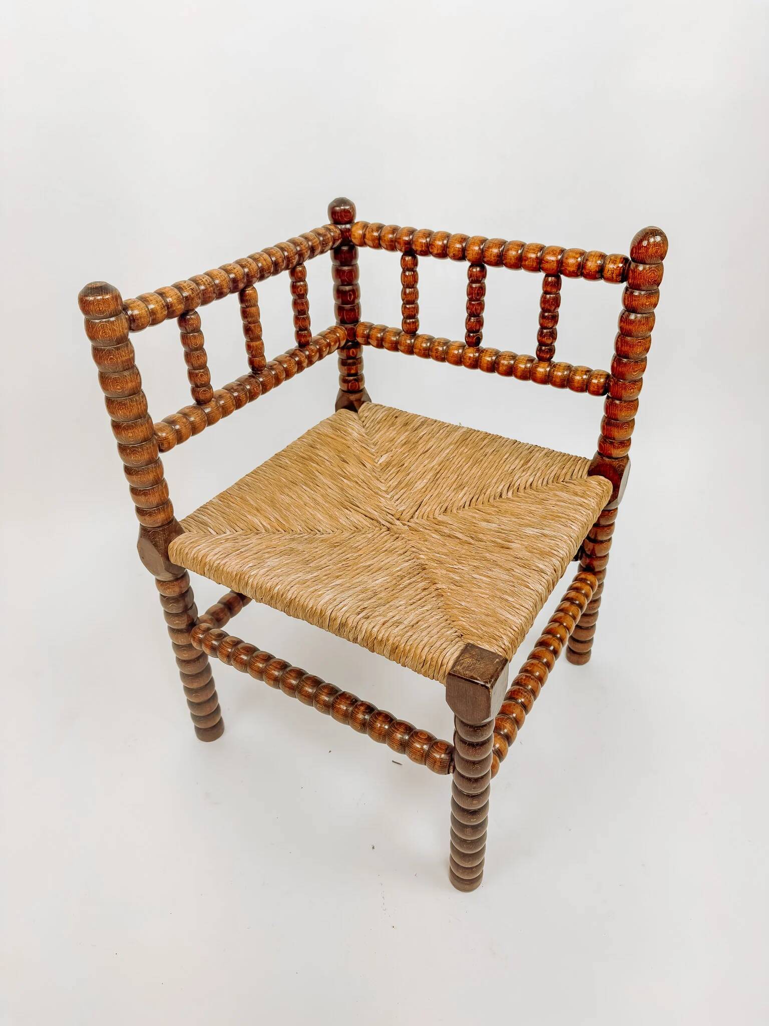 Classic vintage bobbin corner armchair
