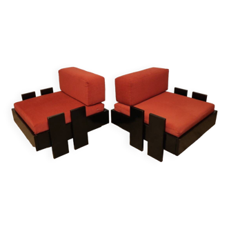 Pair of low vintage armchairs in black lacquered wood and fabric, 1970s