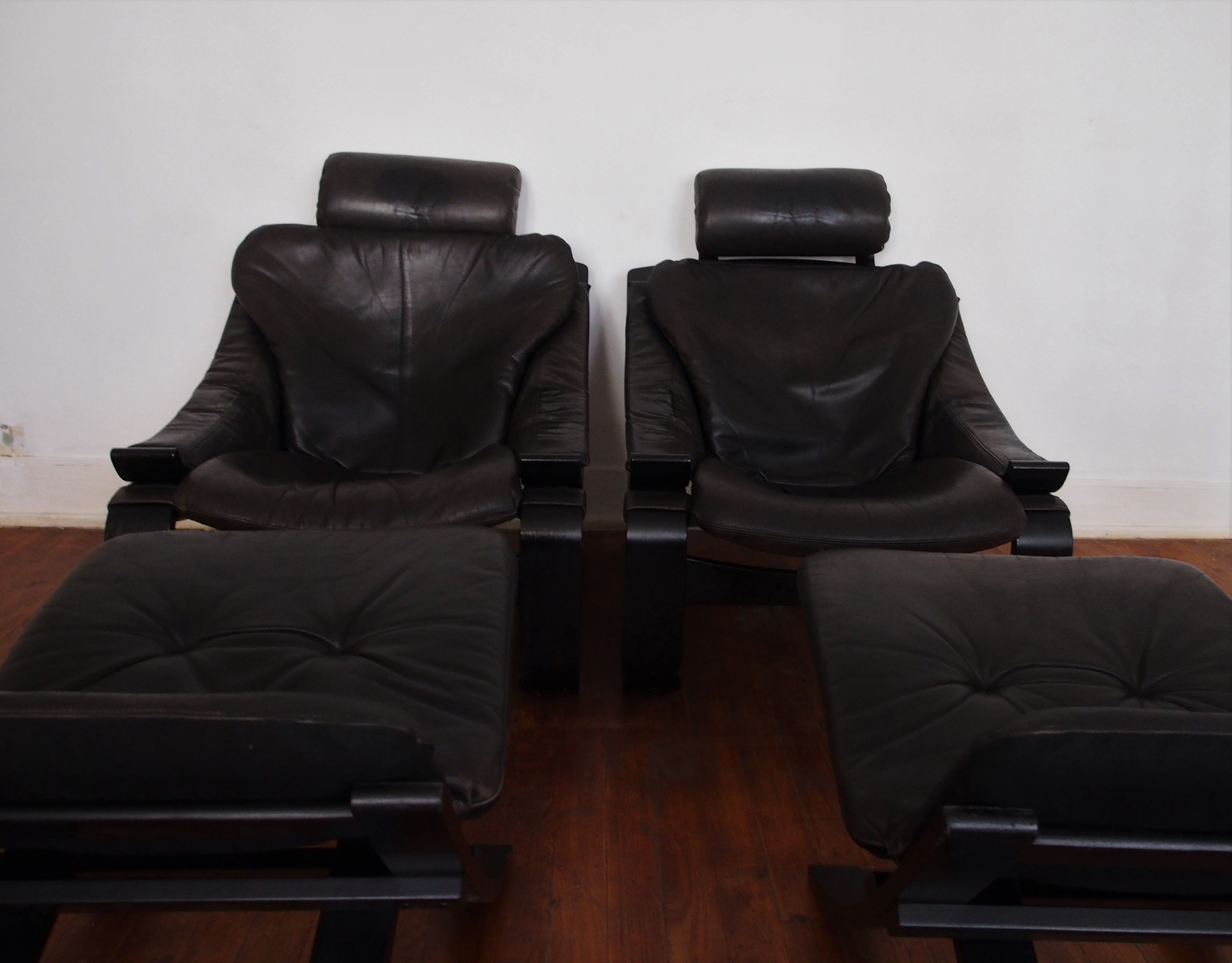 Pair of Scandinavian armchairs and footrests
