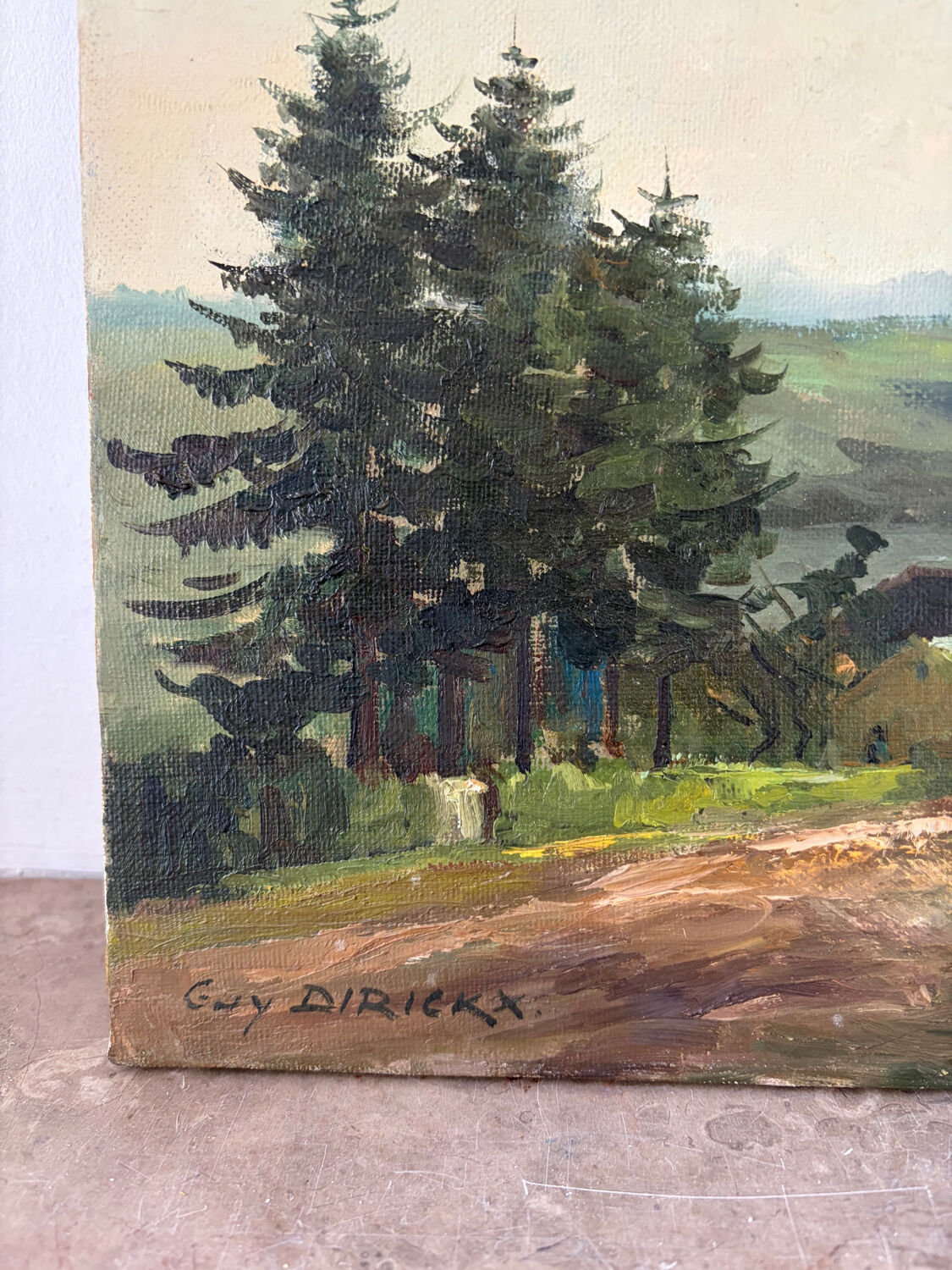 Paysage avec église, huile sur toile signé Guy Dirickx