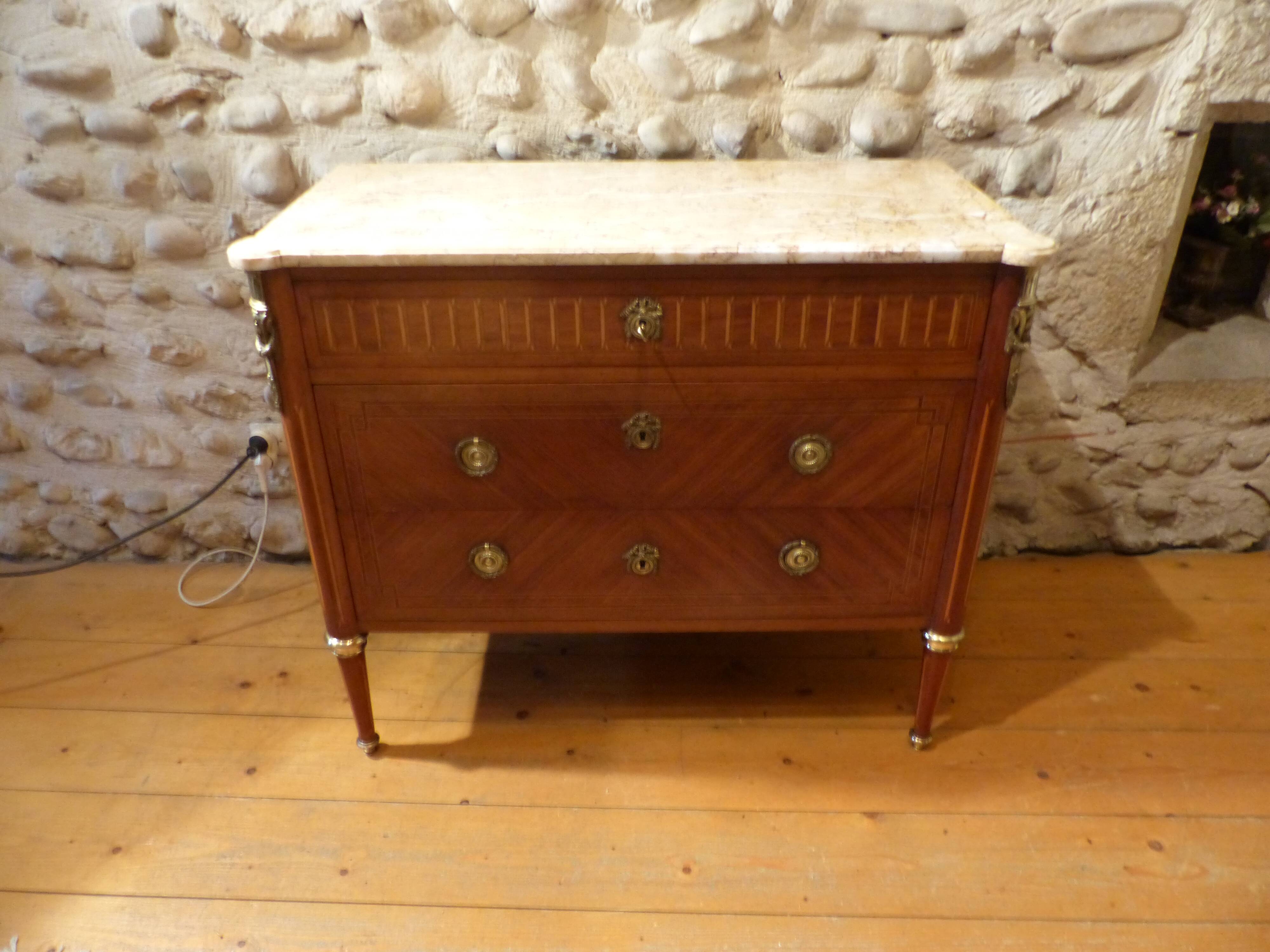 Louis XVI-style dresser marked on marble