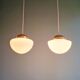 Duo of Art Deco suspensions in white opaline, 1920s-30s