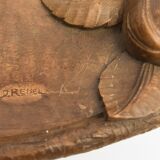 Carved wooden top signed J. Rebel