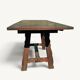 Rustic oak parquet dining table with two extensions.