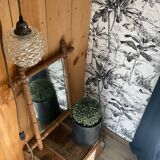 Carved wooden mirror in a bamboo style