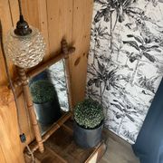 Miroir en bois sculpté façon bambou