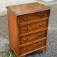 English chest of drawers in light wood with 4 drawers