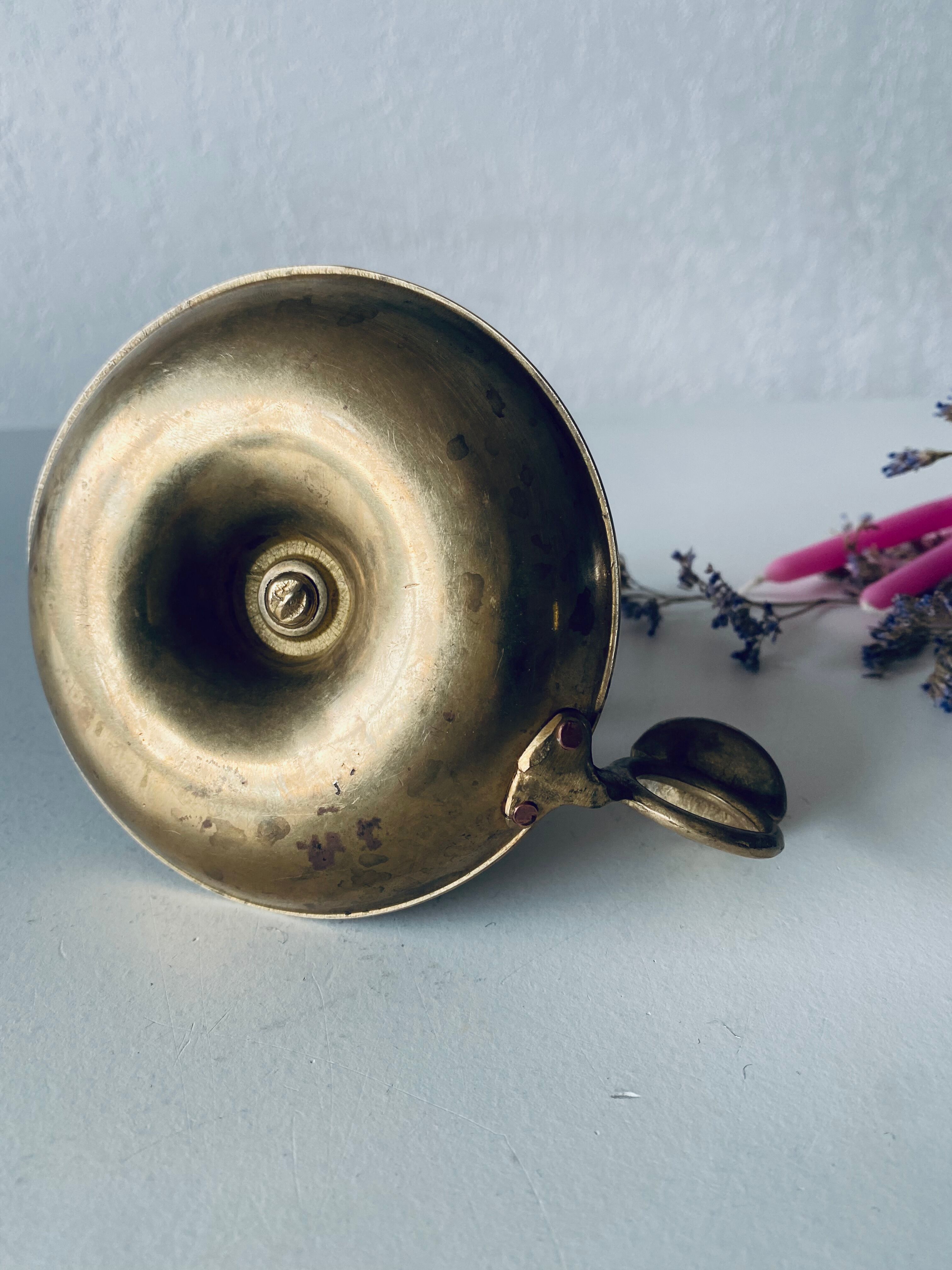 Antique brass candle holder