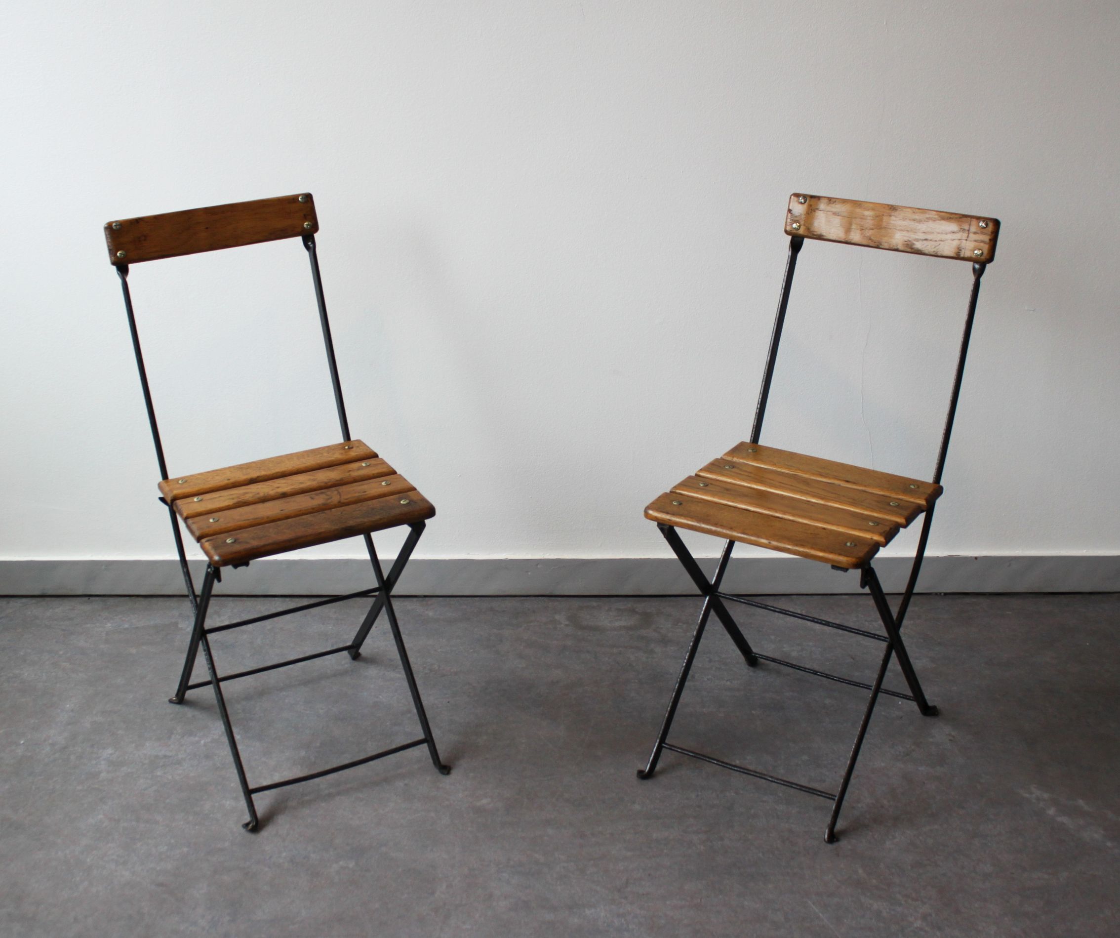 Pair of folding bistro chairs, France, 1930