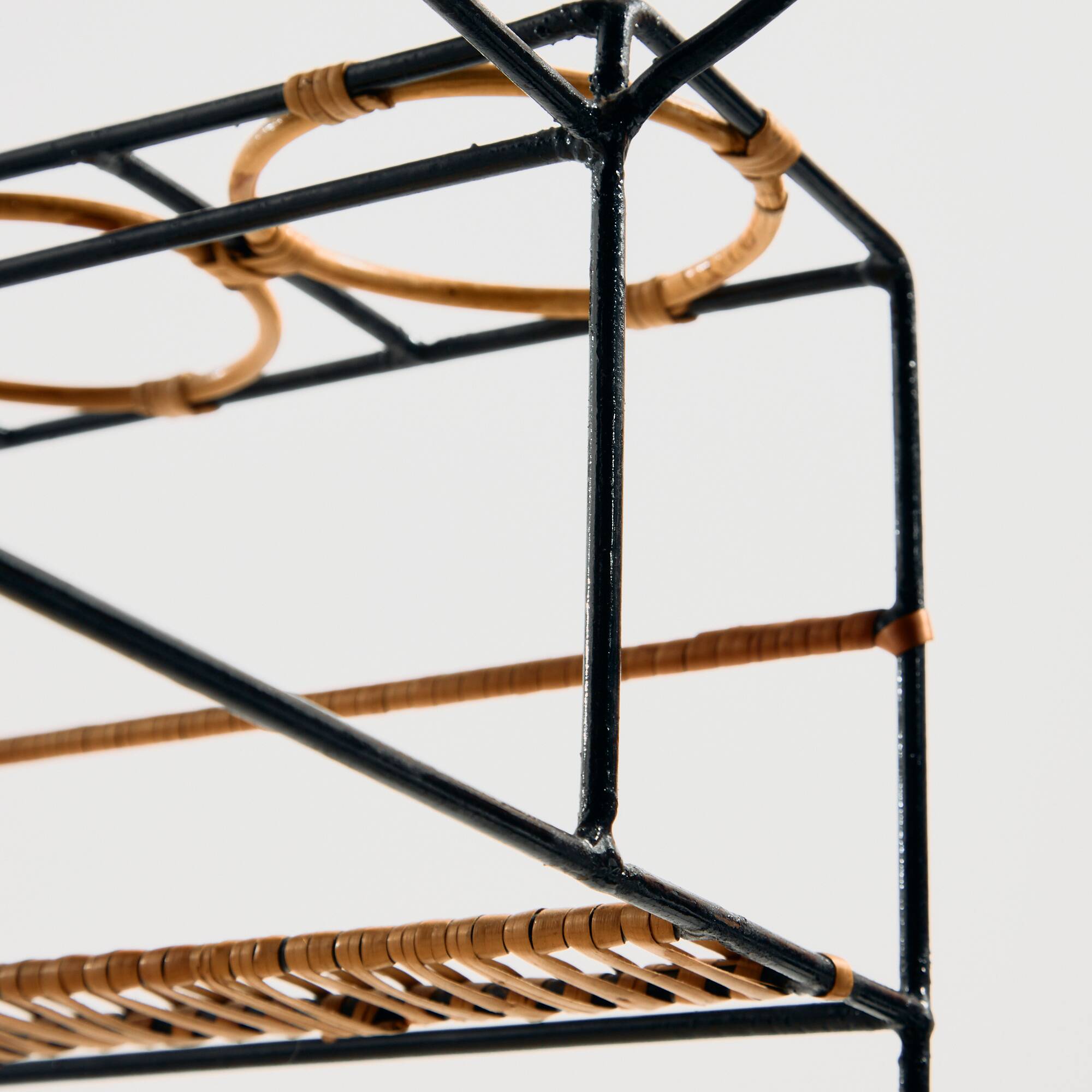 Metal cart with bamboo and wicker details.