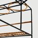 Metal cart with bamboo and wicker details.