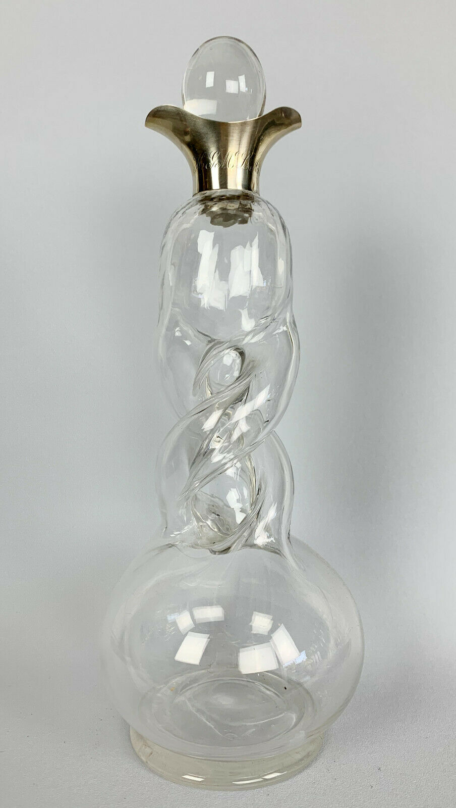Blown glass carafe with silver frame