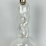 Blown glass carafe with silver frame
