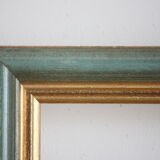 Frame in gilded and green wood