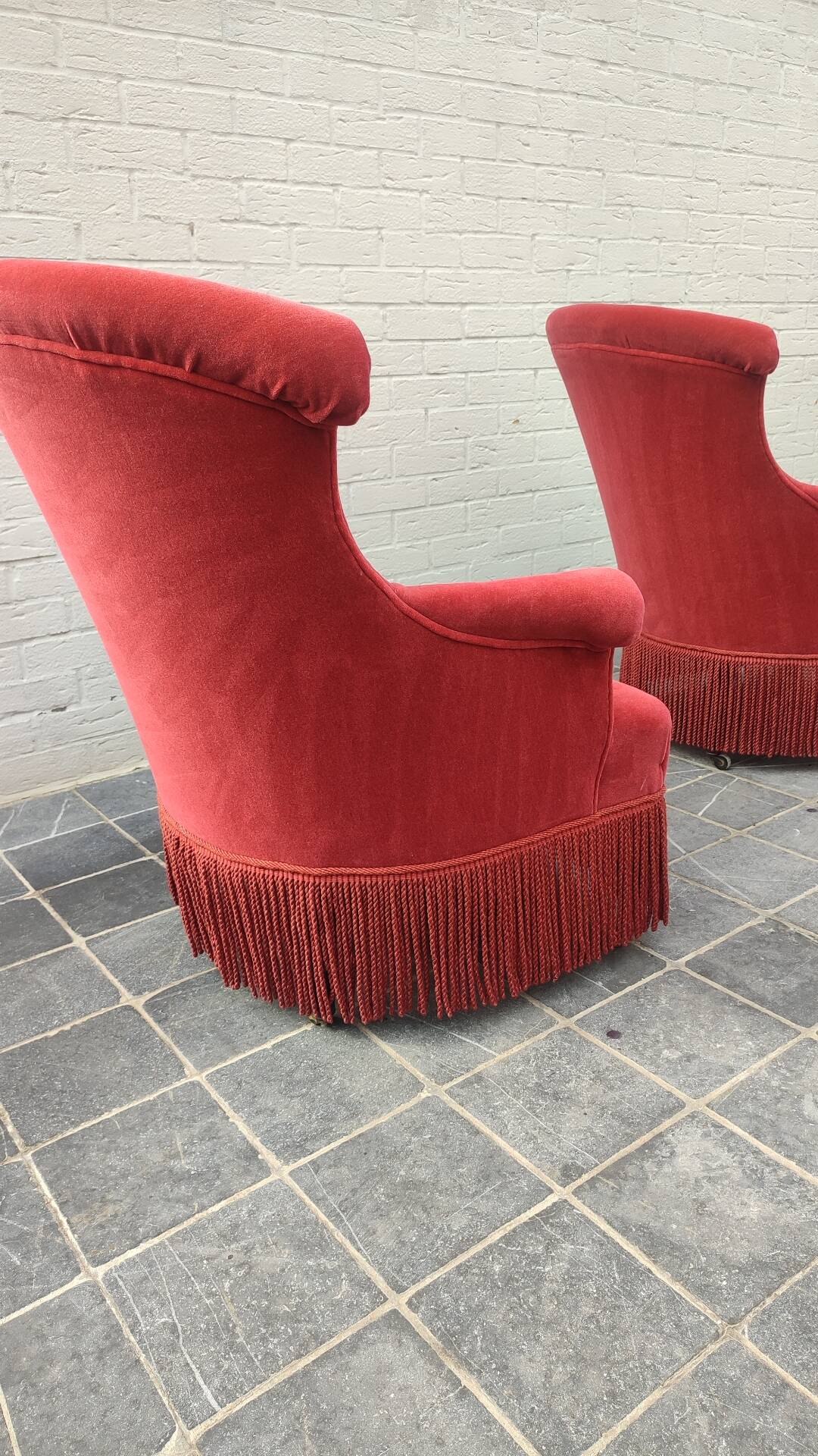 Pair of fringed crapaud armchairs