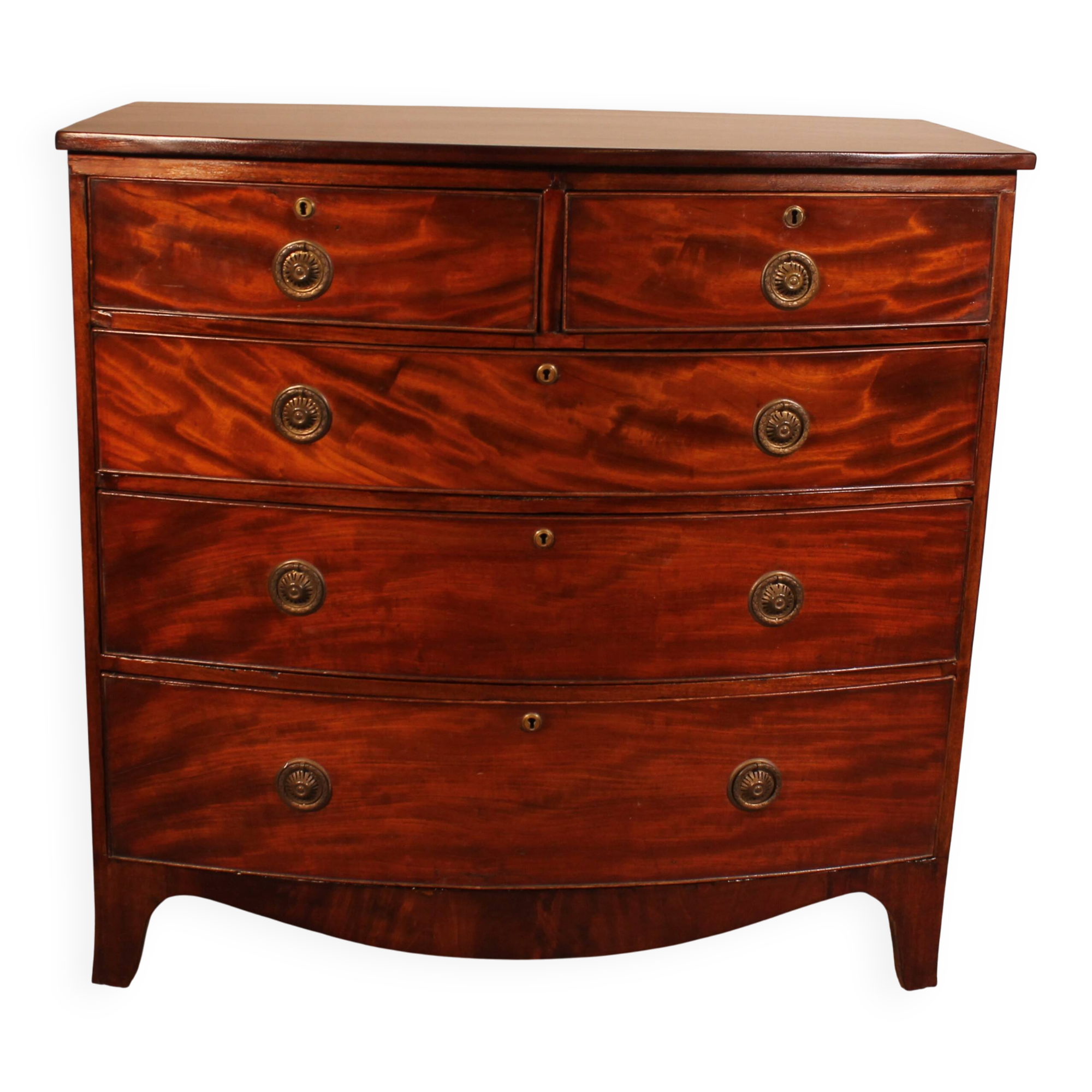Regency period bombé commode in mahogany