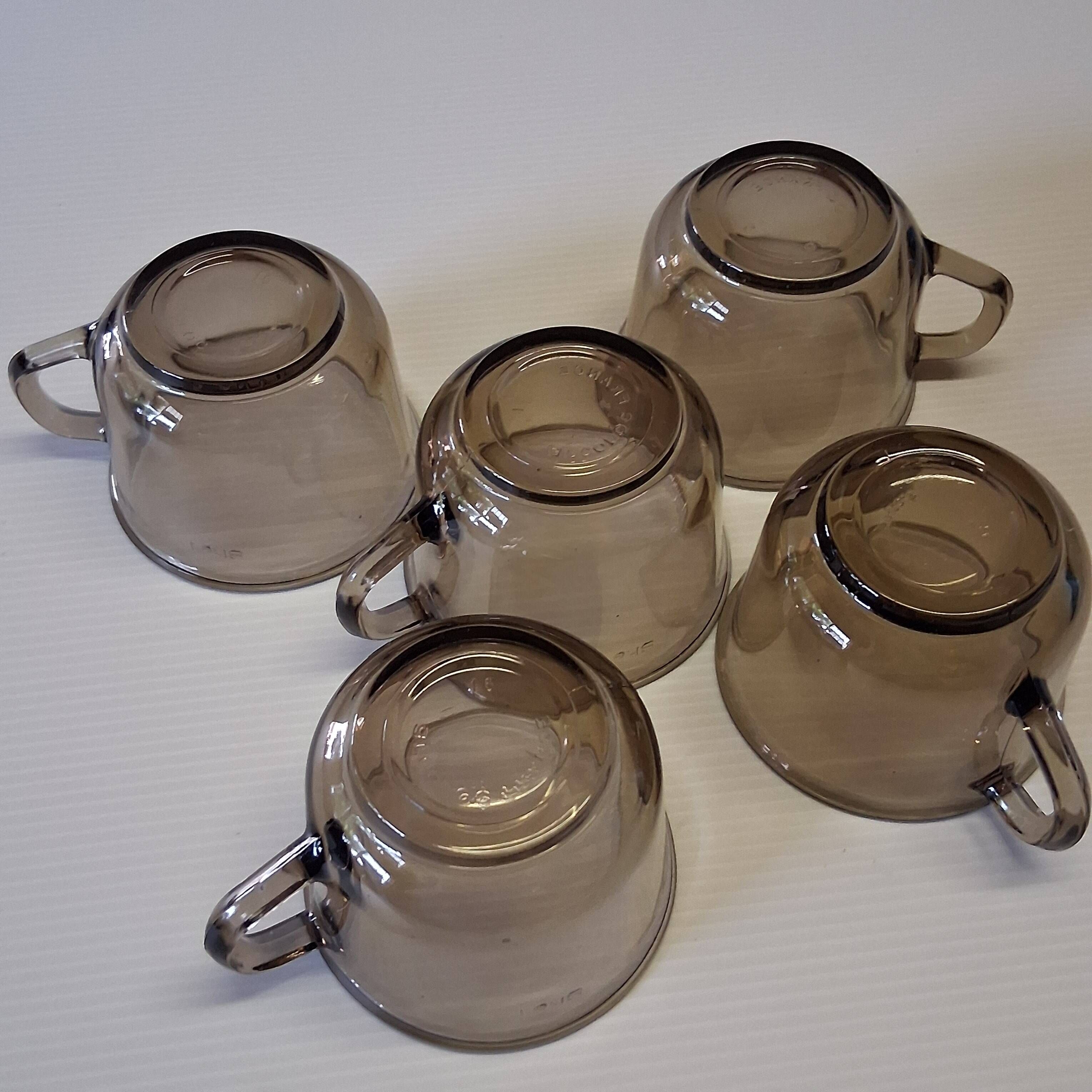 Set of 5 amber black coffee cups from Arcoroc in very good condition.