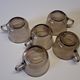Set of 5 amber black coffee cups from Arcoroc in very good condition.