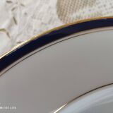 Lot 2 of 12 Limoges porcelain plates bordered midnight blue and gold