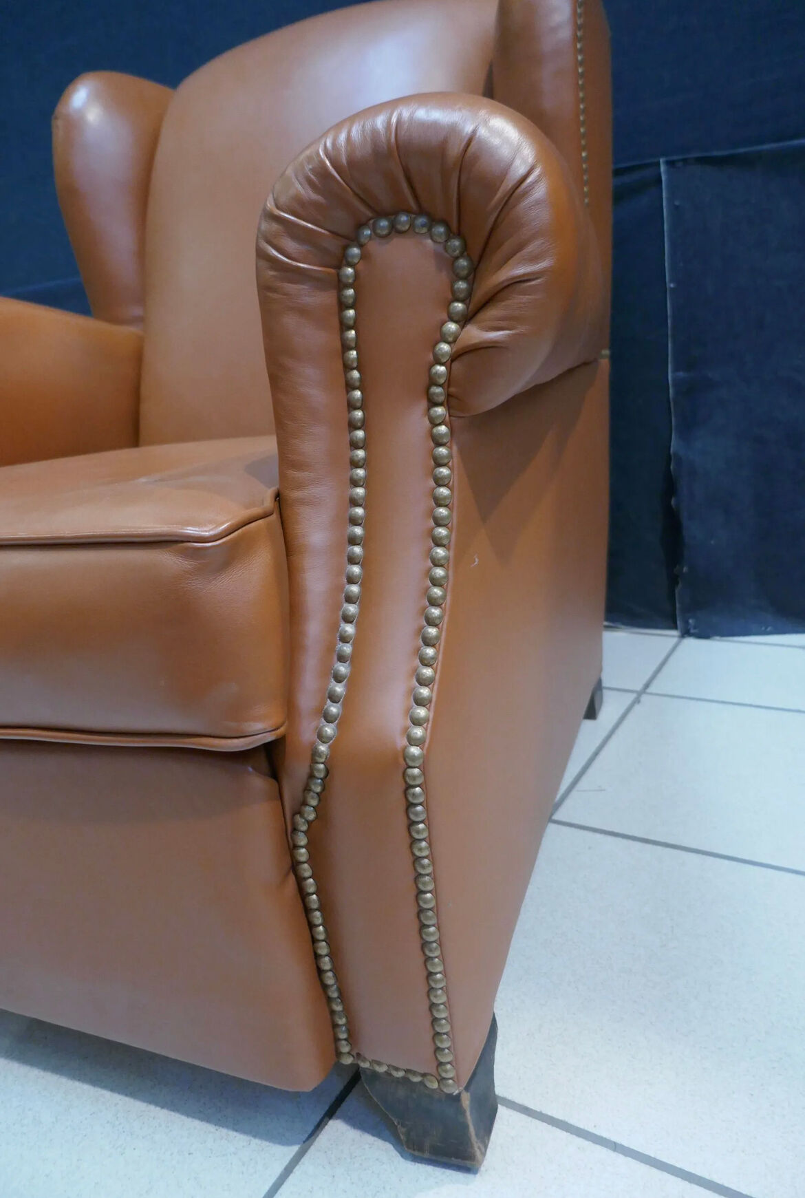 Club armchair with ears of the 40s/ 50s in restored leather