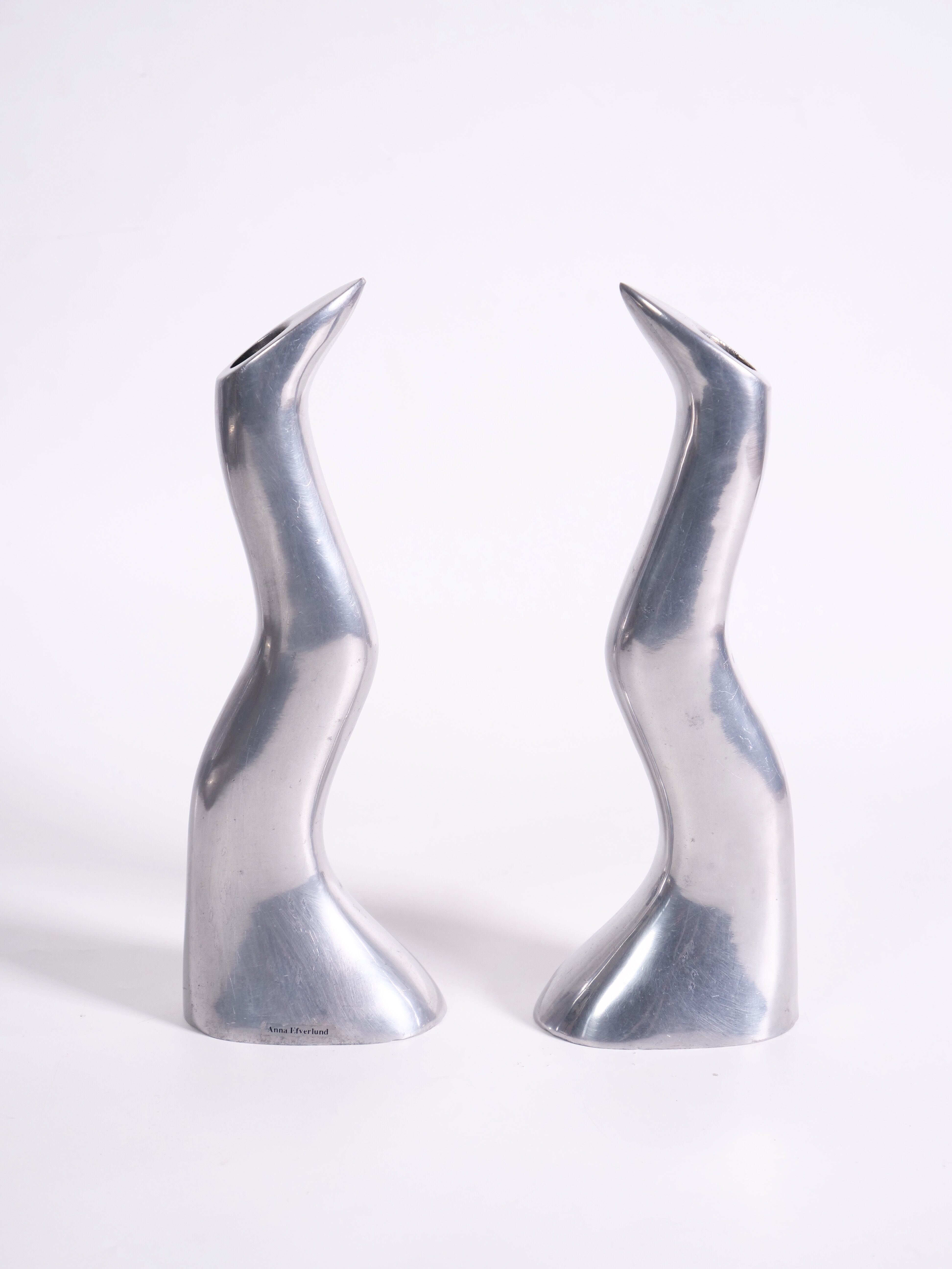 Pair of cast aluminum candle holders by Anna Efverlund
