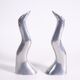 Pair of cast aluminum candle holders by Anna Efverlund