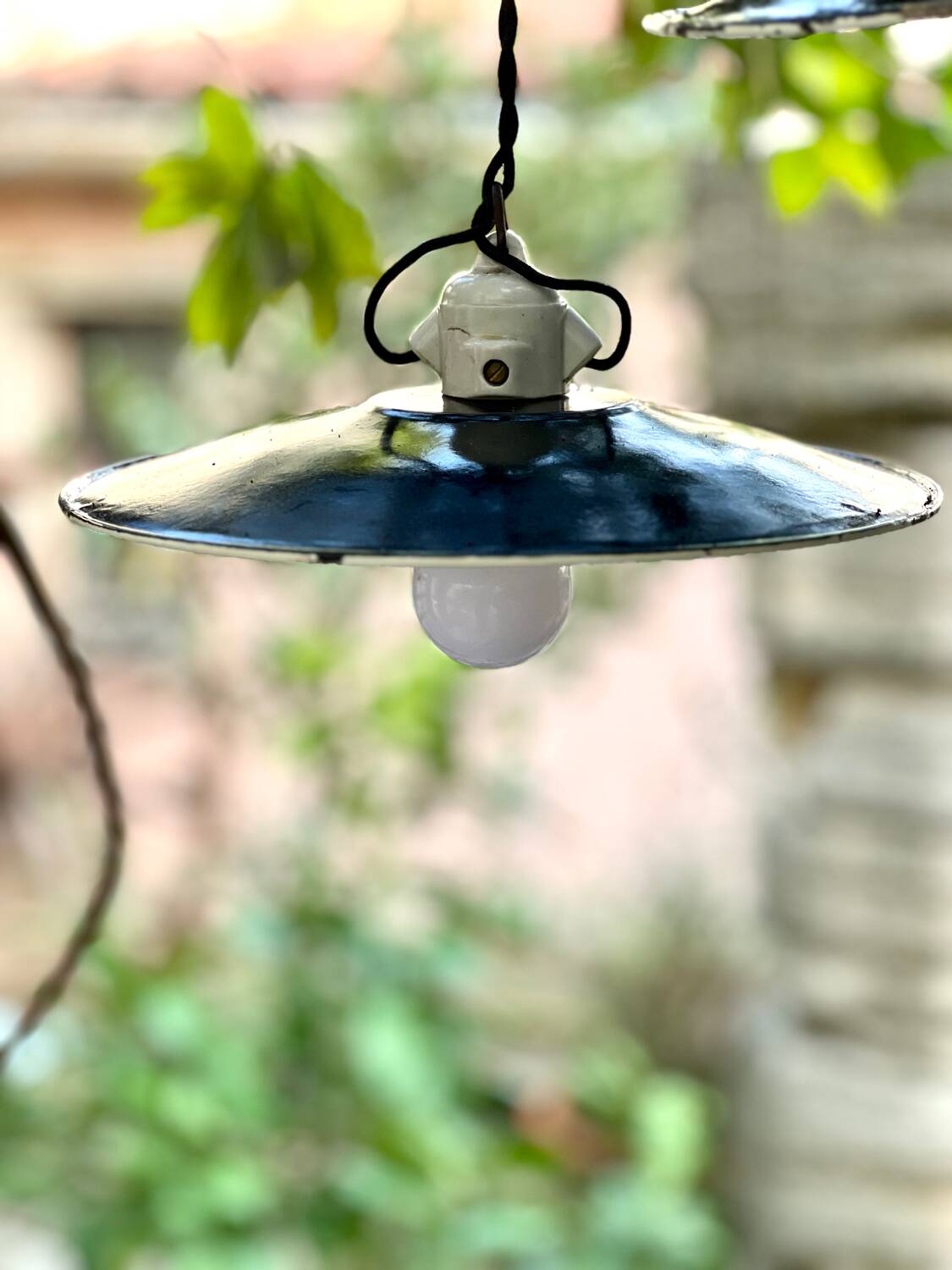 Pair of black and white sheet metal pendant lights, ceramic sockets