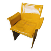 Yellow Korium leather armchair by Matteo Grassi.