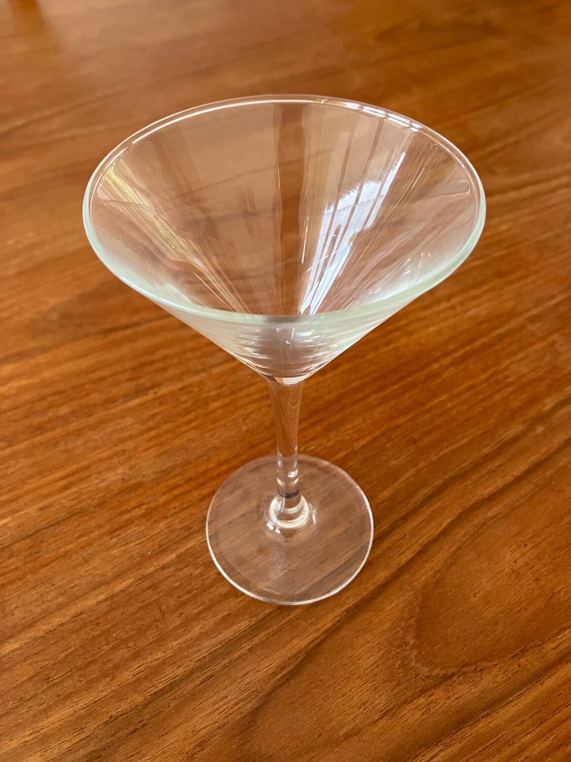 Shaker and five cocktail glasses