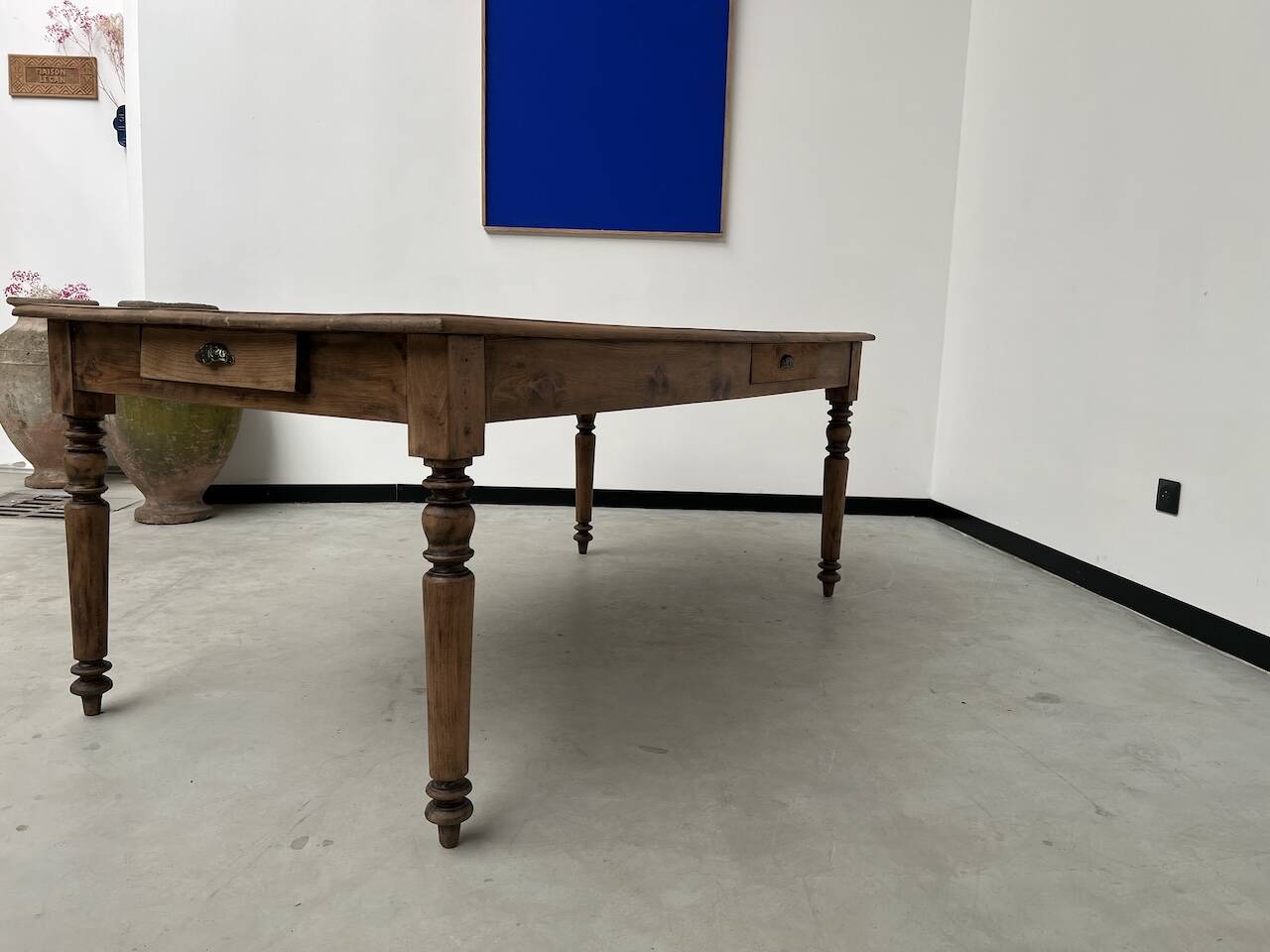 Antique farm table from the 1950s, with 3 drawers and turned legs